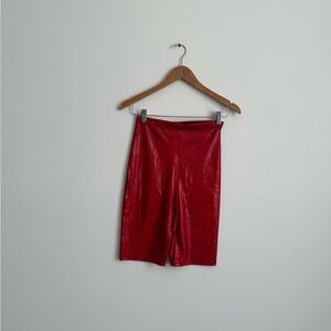 Red metallic crocodile textured biker shorts